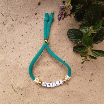 Turquoise letterarmband Smile